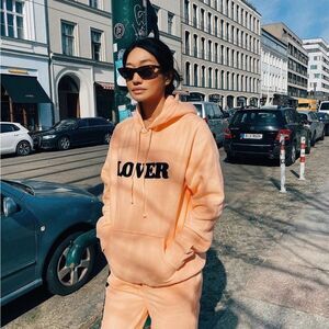 Bianca Chandon Unisex Lover Hoodie in Peach Blush Coral Creamsicle Orange